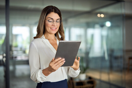 Professional woman holding a tablet